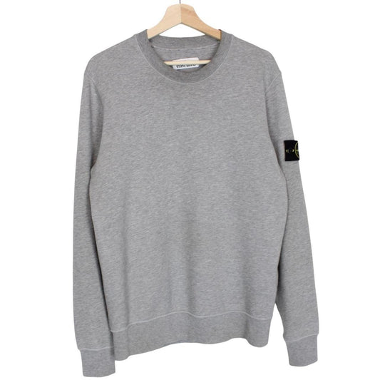 Stone Island grey cotton sweatshirt with logo patch and soft texture.