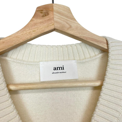 Ami Paris cream and red wool knit sweater vest with heart logo detail.