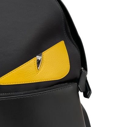 Fendi black and yellow nylon/leather backpack with monster bug eyes design.