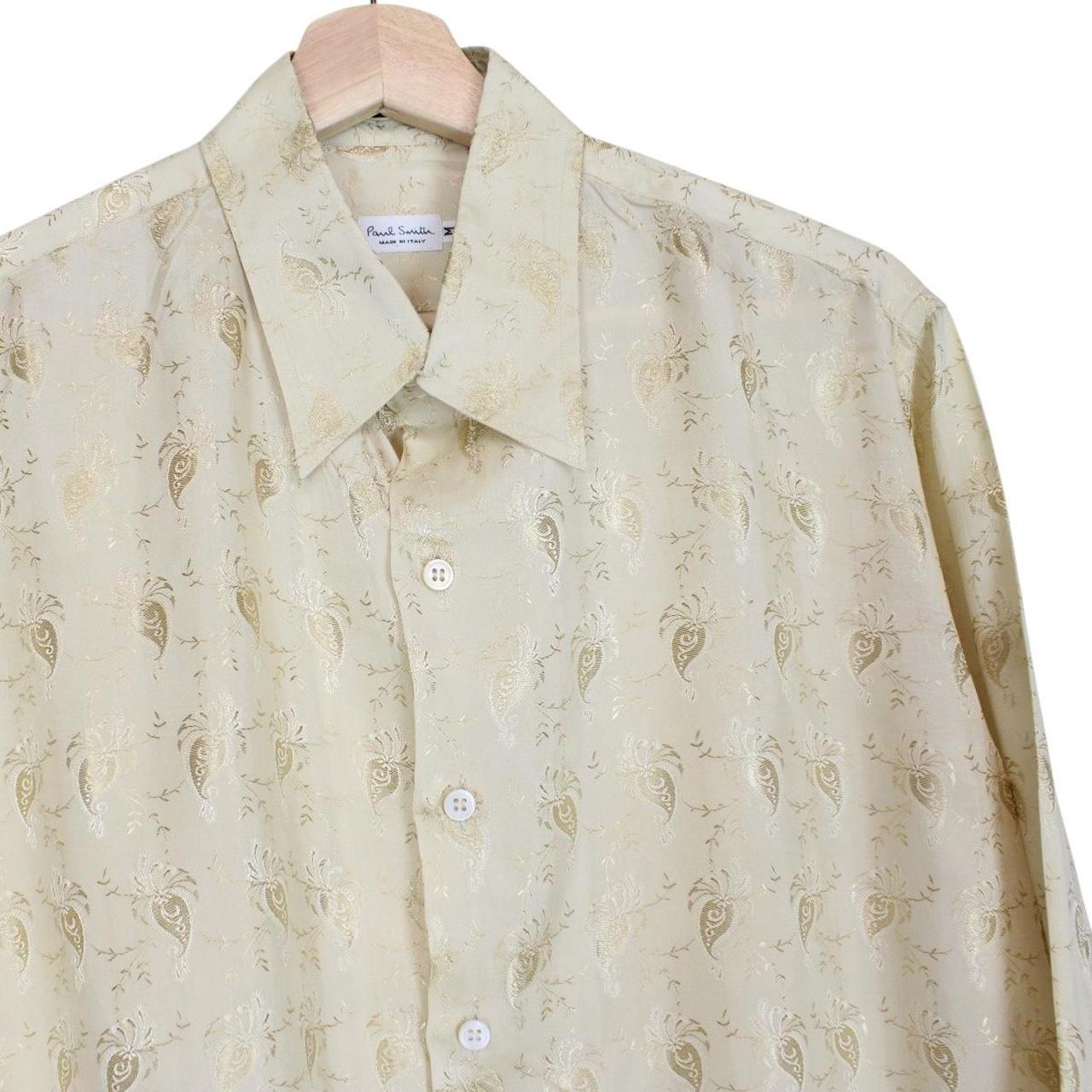 Paul Smith beige long sleeve silk shirt with subtle logo detail and smooth texture.