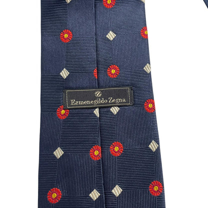 Ermenegildo Zegna navy blue silk tie with subtle sheen and elegant texture.