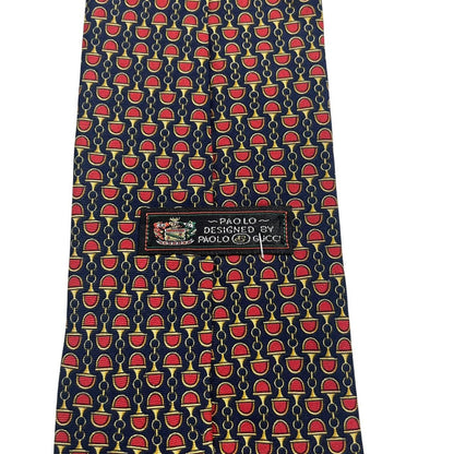Gucci silk tie red and navy blue horsebit pattern with logo detail.