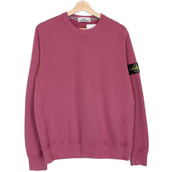 Stone Island mauve cotton sweatshirt with embroidered compass logo and ribbed cuffs.