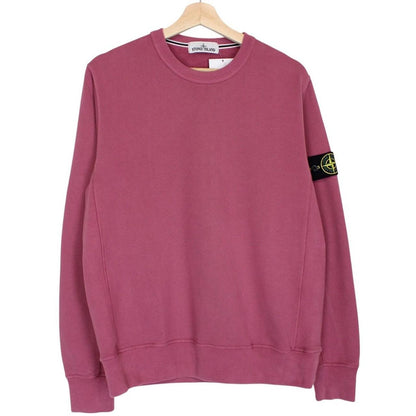 Stone Island mauve cotton sweatshirt with embroidered compass logo and ribbed cuffs.