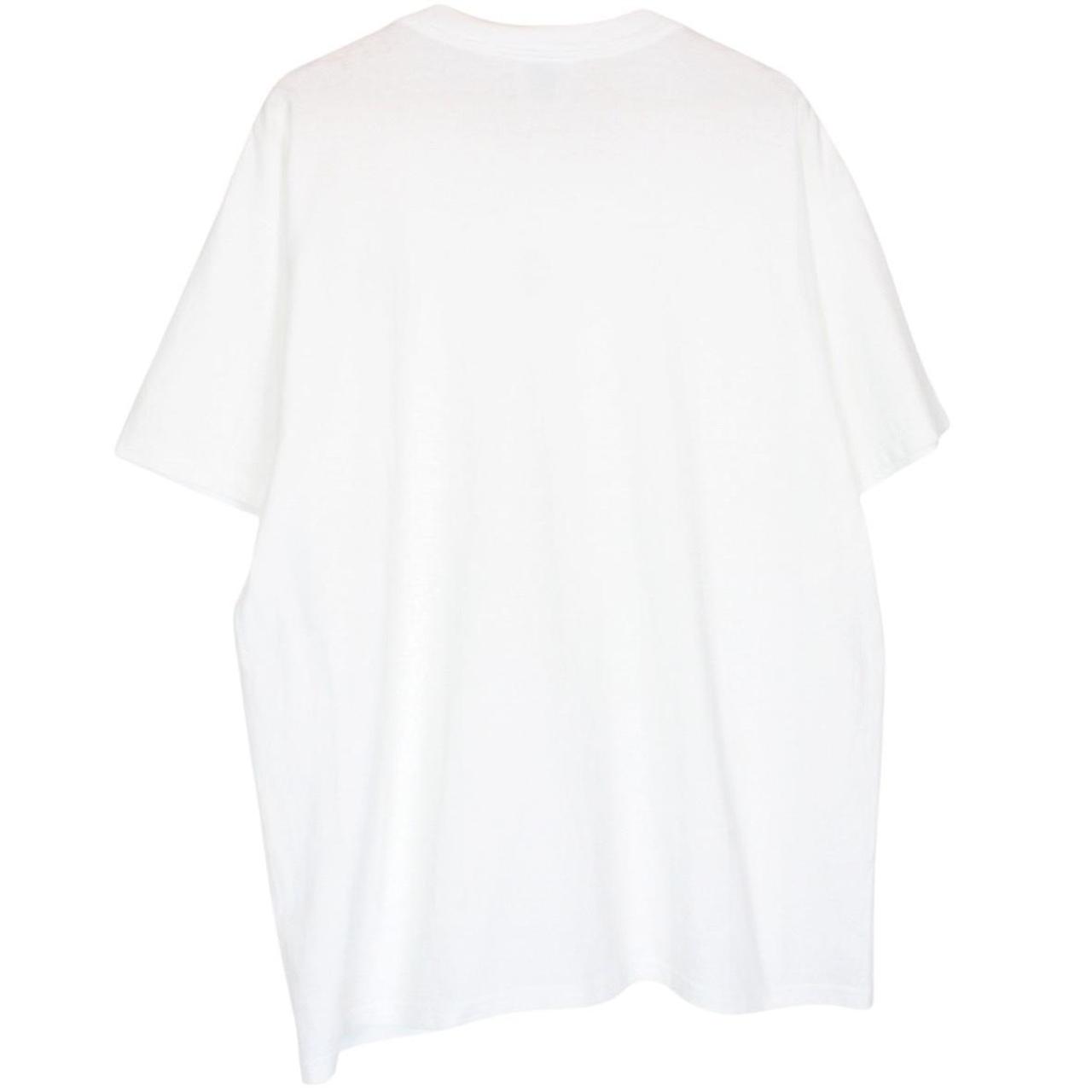 Nike white short sleeve cotton t-shirt with chest pocket and vintage logo.