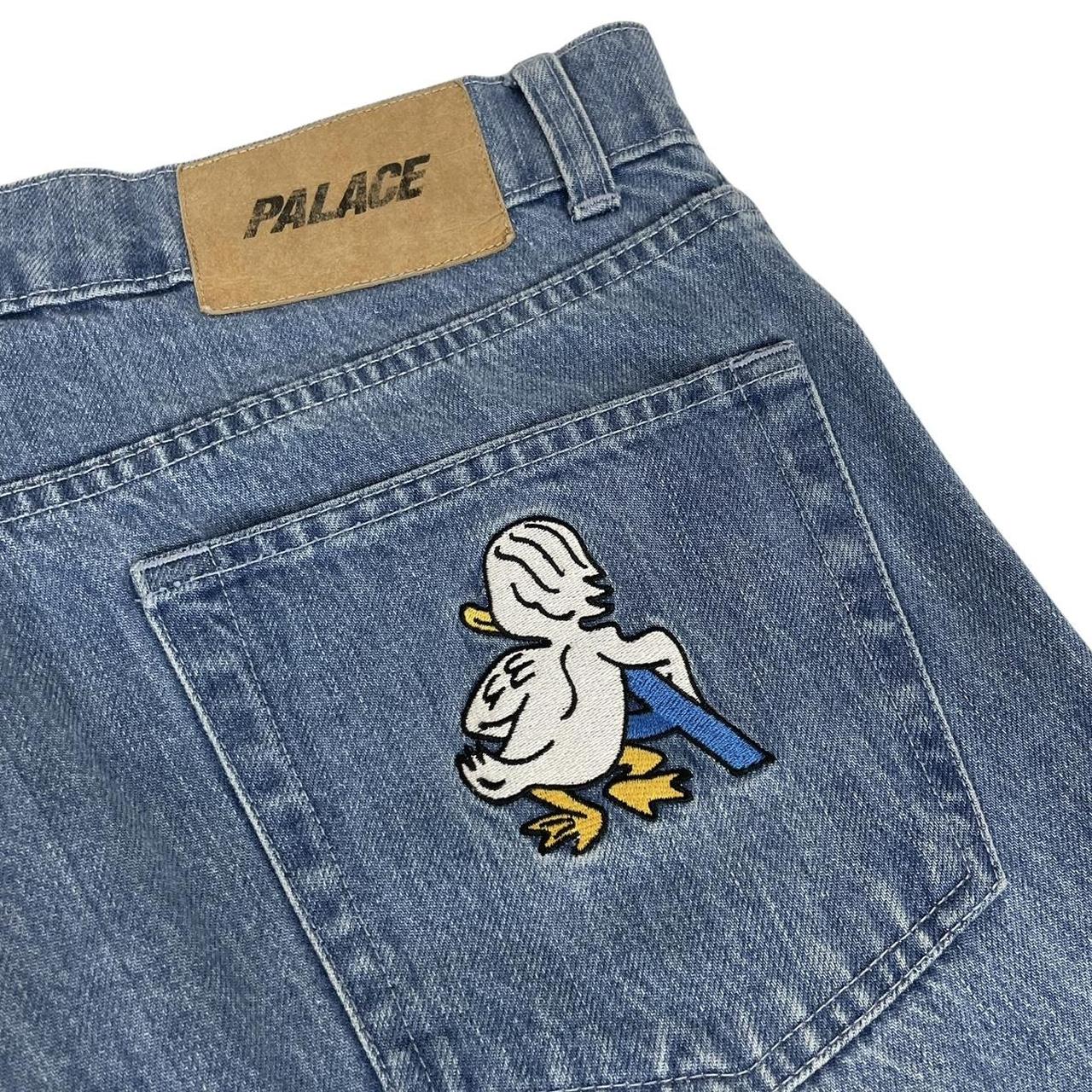 Palace blue straight jeans with mid stone wash and quacked pattern details.
