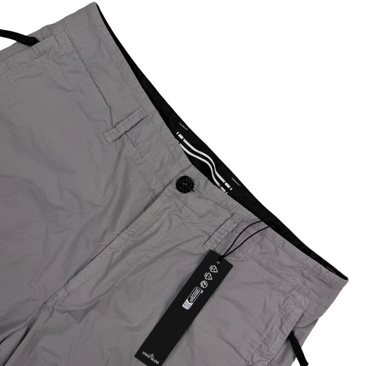 Stone Island grey cargo shorts with logo patch and multiple pockets in cotton material.