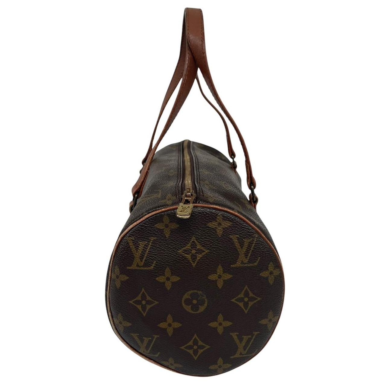 Louis Vuitton duffel bag brown and tan monogram canvas with logo pattern and wear.