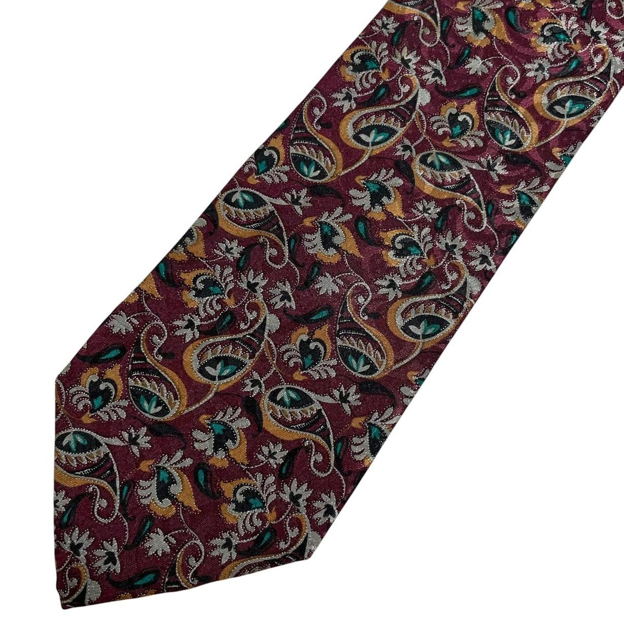 Christian Dior multicoloured floral print tie, polyester material, vibrant patterns throughout.