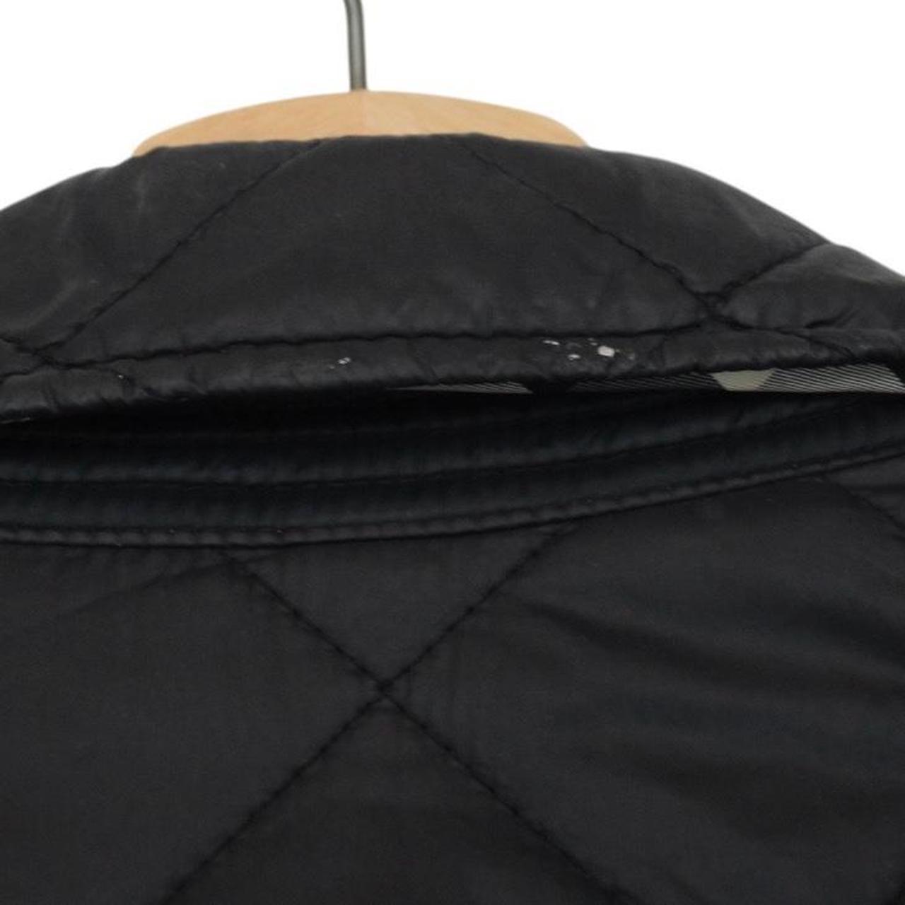 Burberry black quilted field jacket with Nova Check lining and diamond pattern.