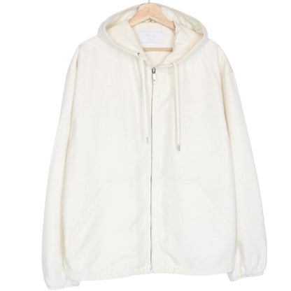 Prada cream silk hooded jacket with triangle logo and full zip detail.