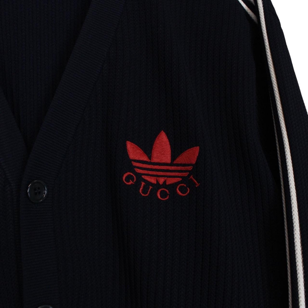 Gucci x Adidas navy blue cardigan jumper with logo detailing and soft viscose material.