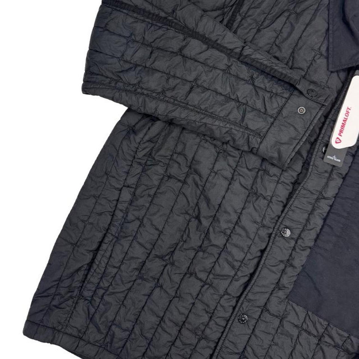 Stone Island black quilted nylon jacket with logo badge and Primaloft-TC material.