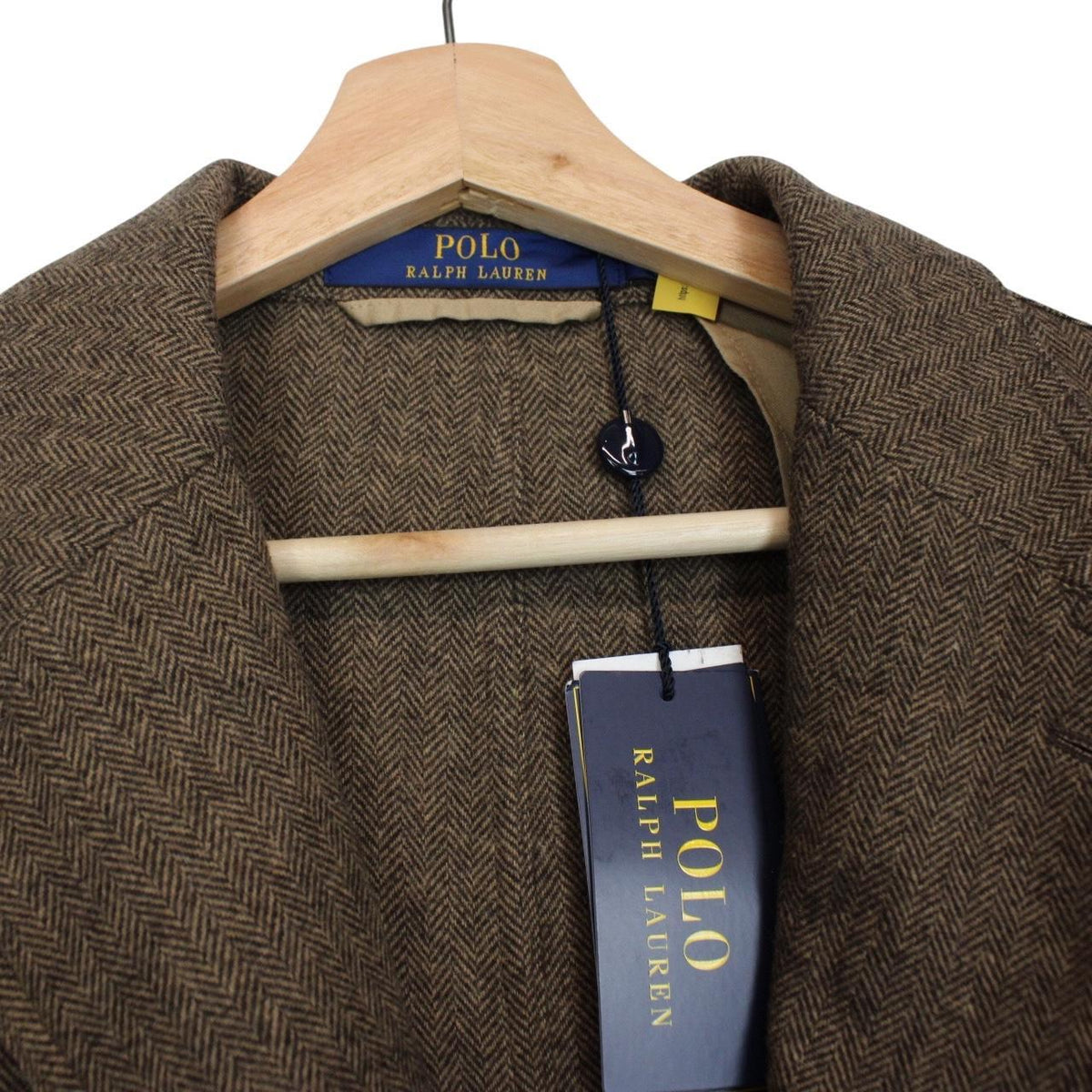 Polo Ralph Lauren brown herringbone wool blend sportcoat blazer with tags and logo.