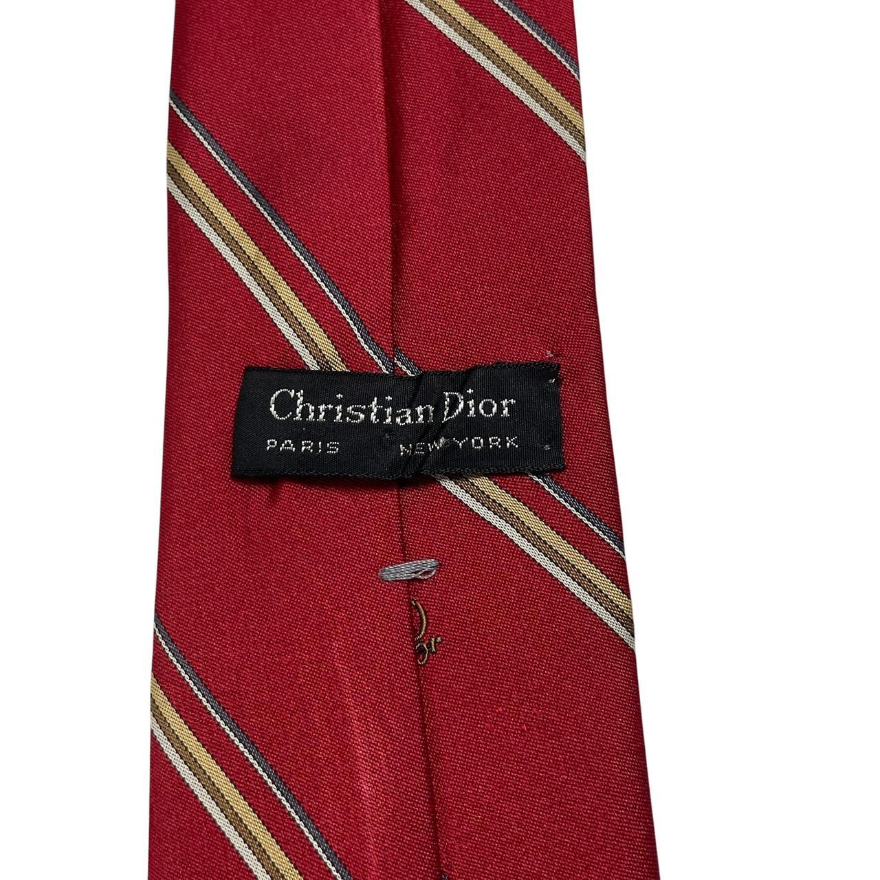 Christian Dior red striped polyester tie with vintage logo and sleek design.