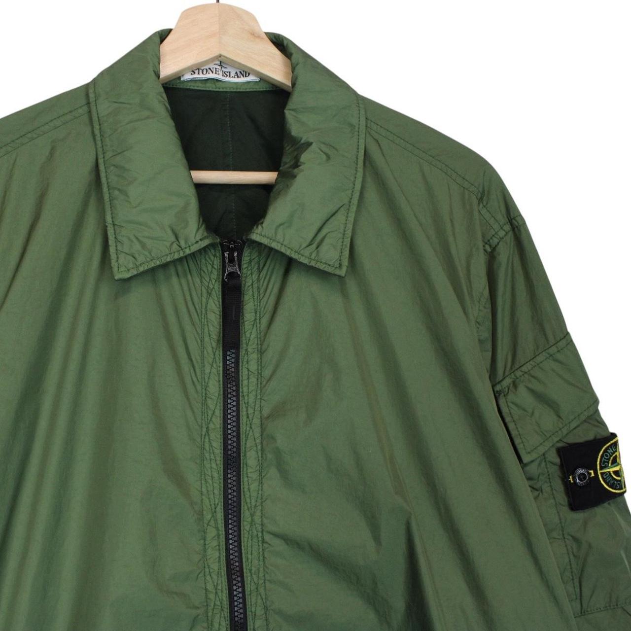 Stone Island green nylon overshirt jacket with full zip and compass logo patch.