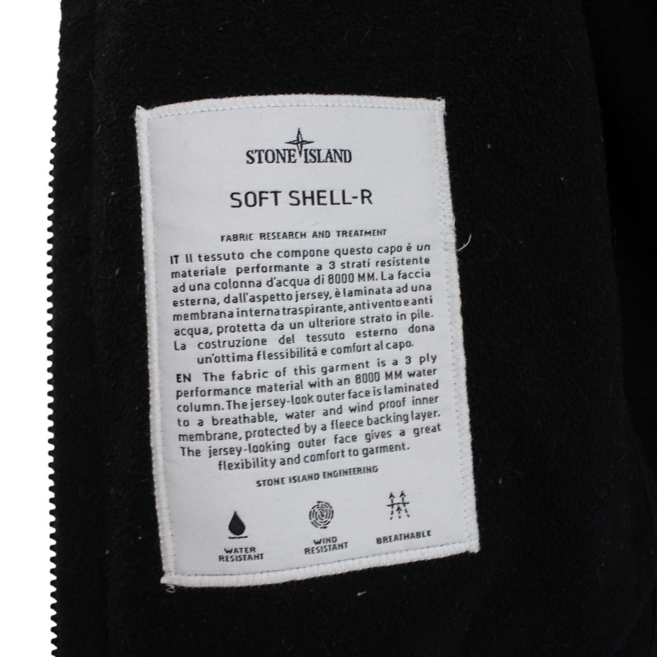 Stone Island black soft shell jacket with full zip and iconic compass logo.