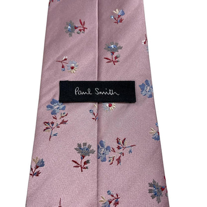 Paul Smith pink silk tie with floral embroidery and signature logo detail.
