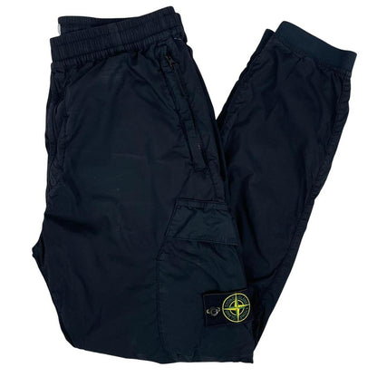 Stone Island navy blue cargo trousers with logo patch and RE-T fit design.