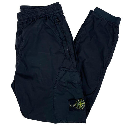 Stone Island navy blue cargo trousers with logo patch and RE-T fit design.