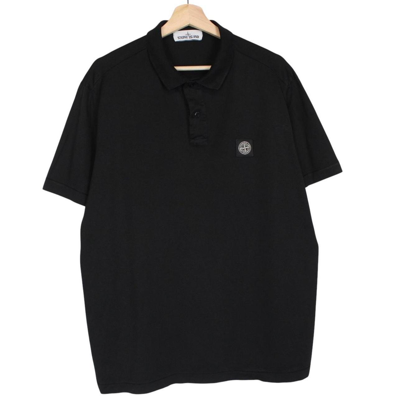 Stone Island black polo shirt with embroidered compass logo and cotton material.