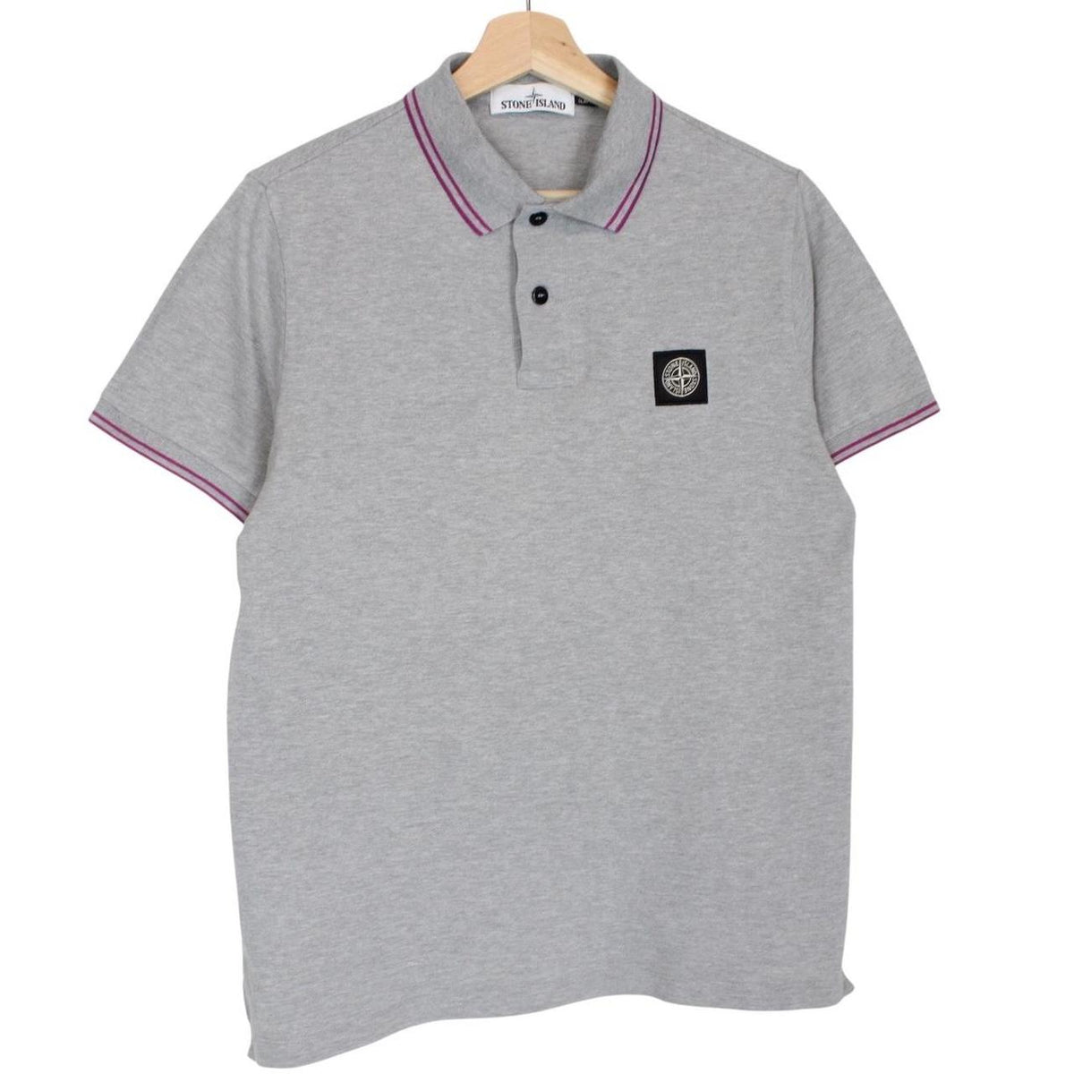 Stone Island grey polo shirt with embroidered compass logo and cotton material.