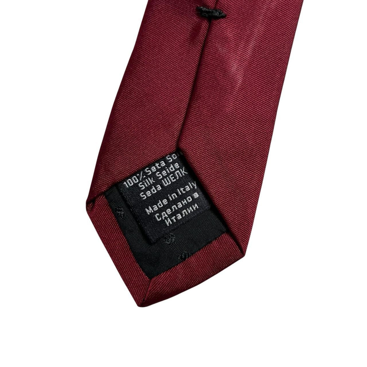 Hugo Boss burgundy silk tie with smooth texture and subtle sheen.