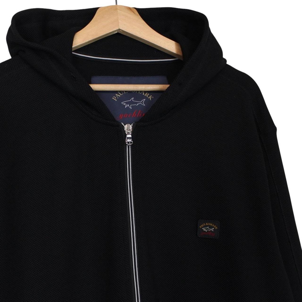 Paul & Shark black hoodie with logo patch, full zip, made of cotton.