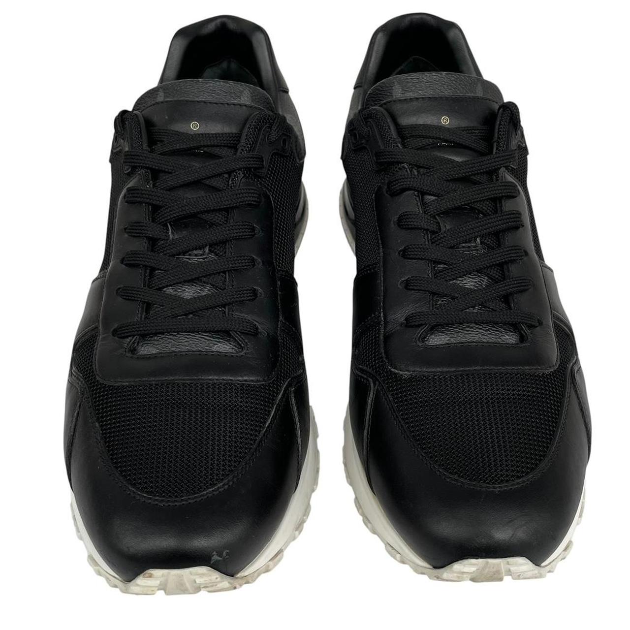 Louis Vuitton black trainers featuring monogram pattern and leather-mesh material.
