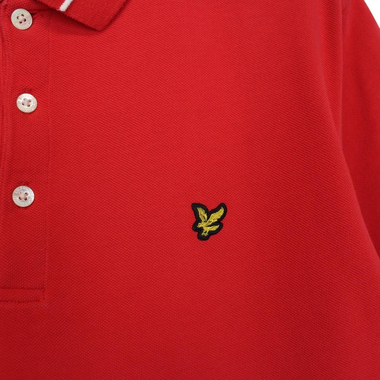 Lyle & Scott red short sleeve polo shirt with embroidered logo and cotton material.