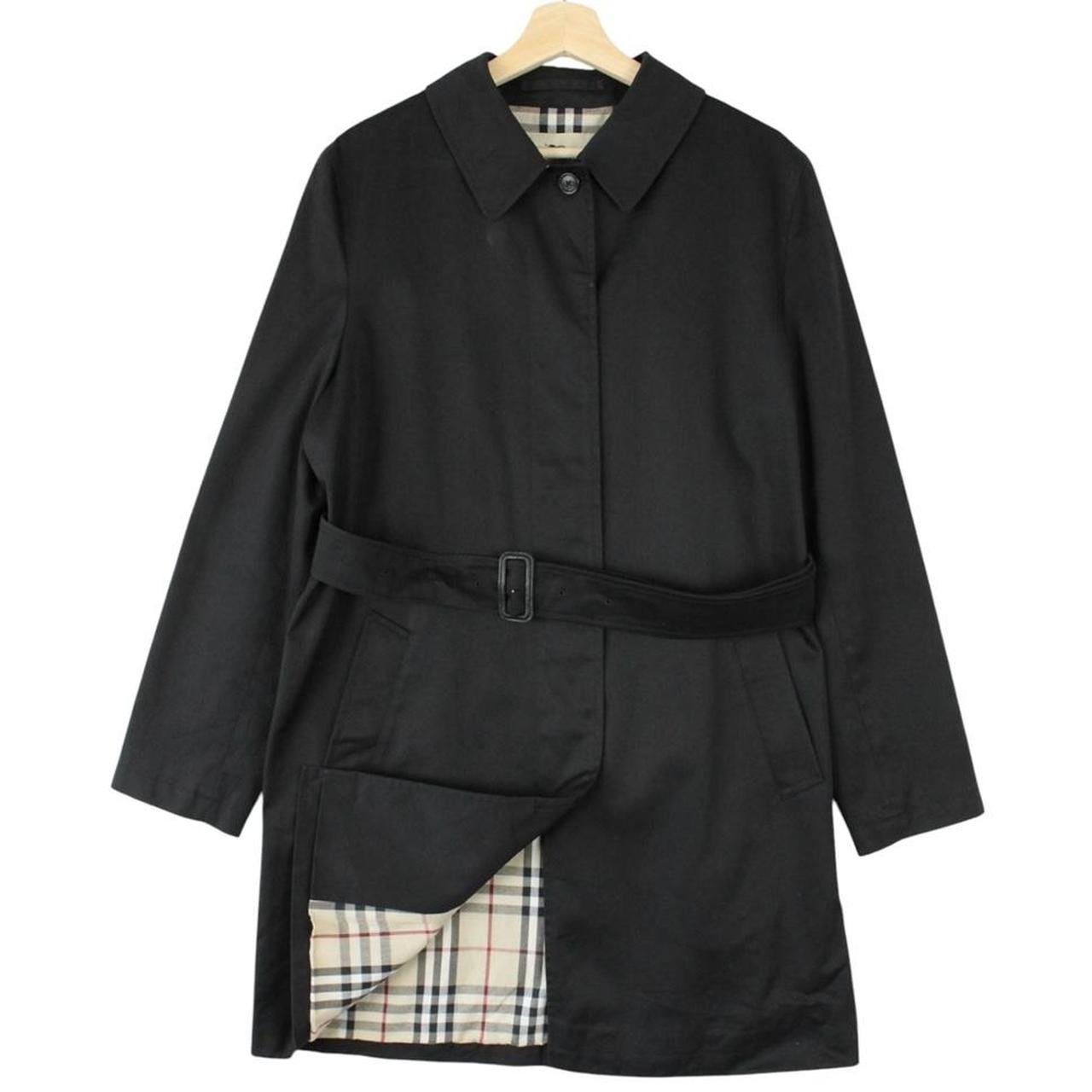 Burberry black trench coat with Nova Check pattern and belted waist in cotton.