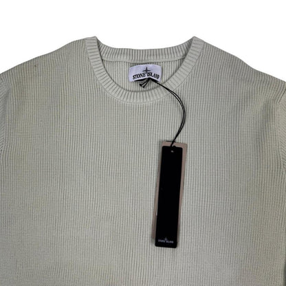 Stone Island beige waffle knit jumper with logo patch and organic cotton material.