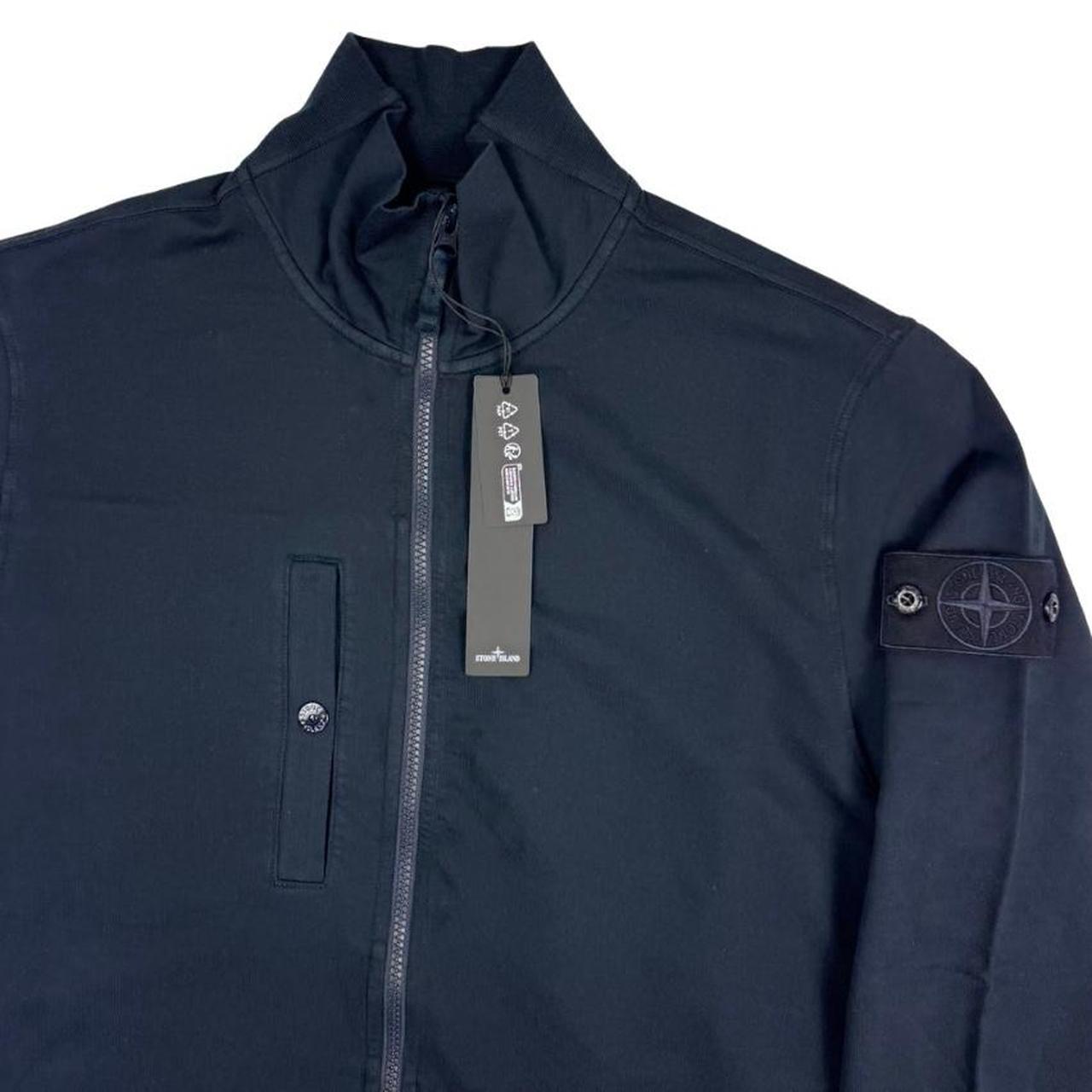 Stone Island navy blue knit full zip jumper with ghost logo and cotton blend material.
