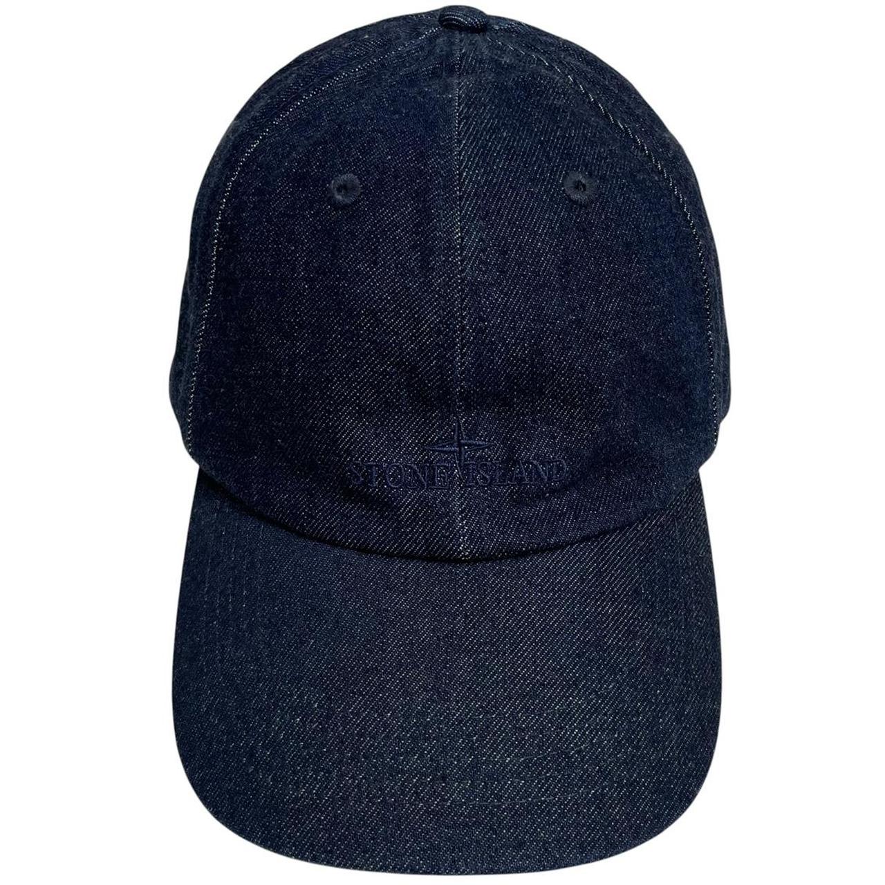 Stone Island blue denim baseball cap with diagonal twill texture and logo patch.