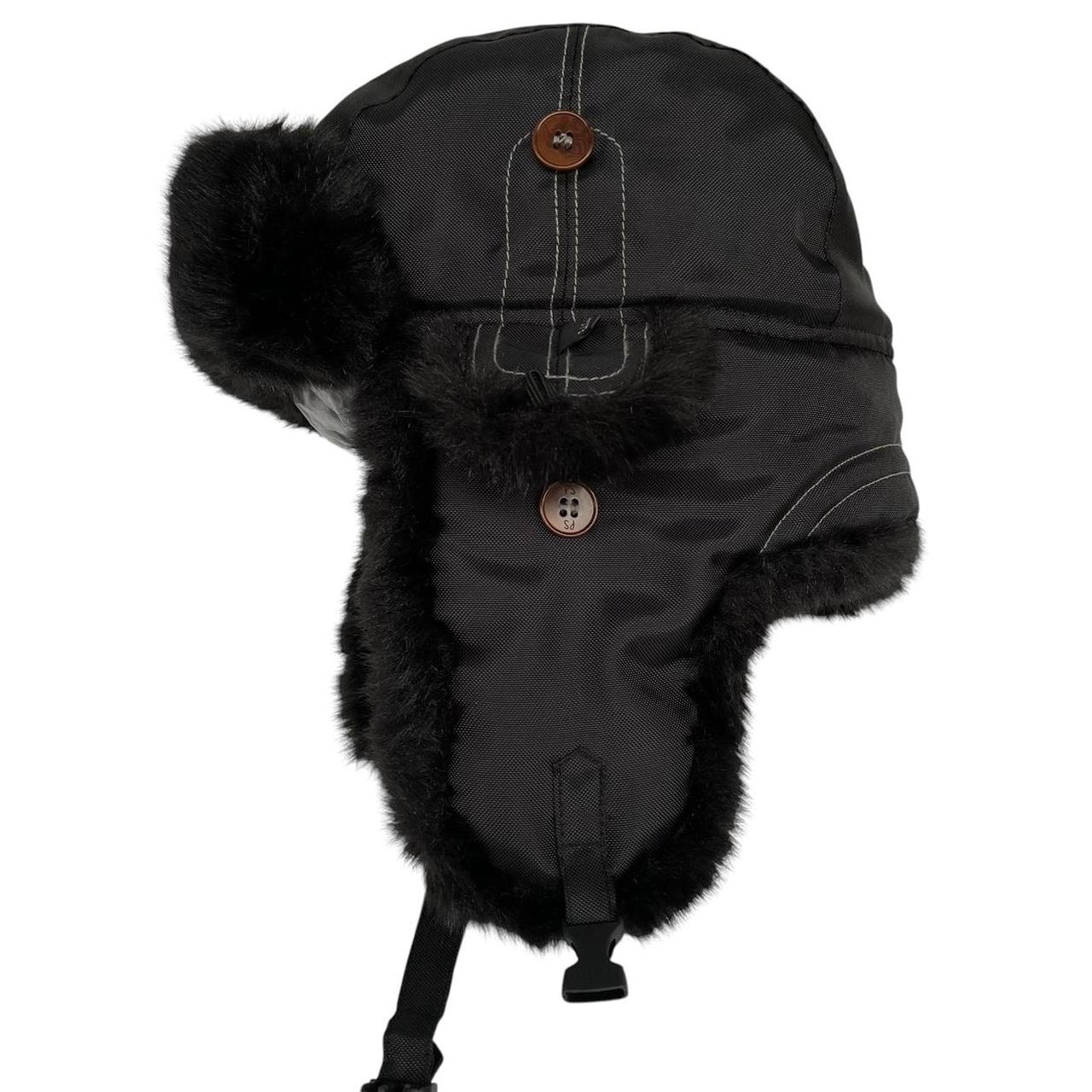 Paul Smith black nylon trapper hat with tags, featuring classic design and logo details.
