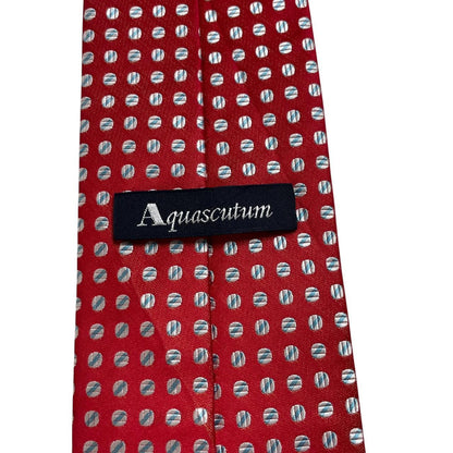 Aquascutum red silk tie with classic logo and smooth texture.