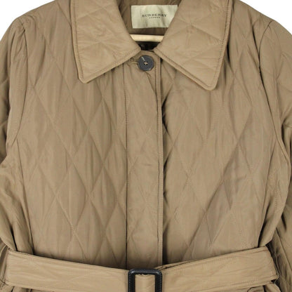 Burberry tan brown belted coat with diamond quilted pattern and logo detailing.