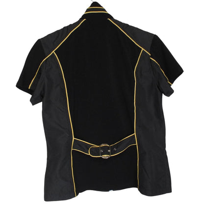 Christian Dior black and yellow jacket with 'Remove Before Flight' graphic detail.