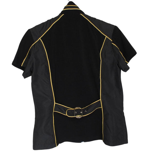 Christian Dior black and yellow jacket with 'Remove Before Flight' graphic detail.