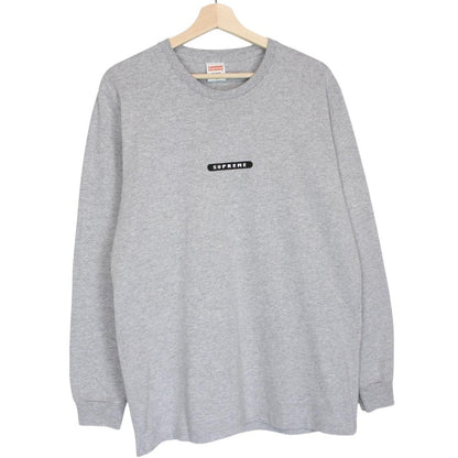Supreme grey and pink long sleeve cotton t-shirt with wild print and pocket detail.