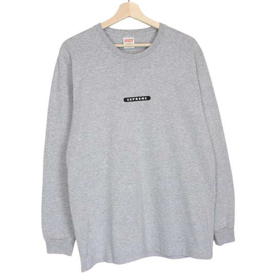 Supreme grey and pink long sleeve cotton t-shirt with wild print and pocket detail.