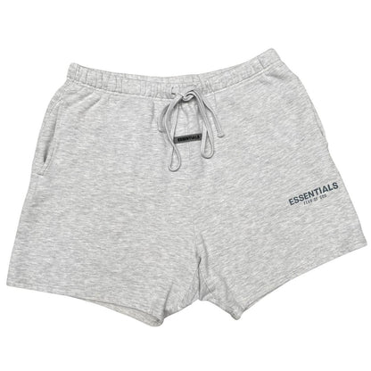 Essentials grey jogger shorts cotton material with logo detail and relaxed fit.