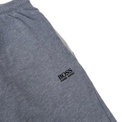 Hugo Boss blue jogger shorts with elastic waistband and logo detail.