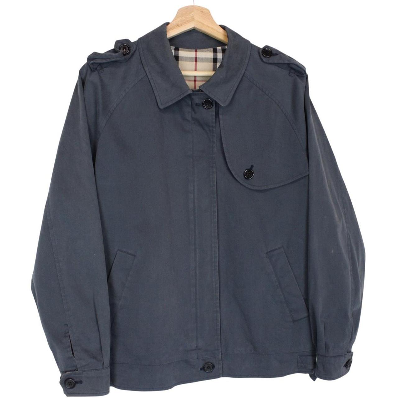 Burberry blue Harrington jacket with Nova Check lining and faint stains on sleeve.