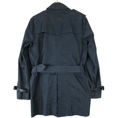 Burberry navy blue trench coat with Nova Check pattern and double-breasted design.