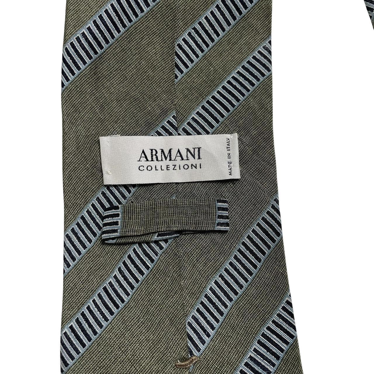 Armani green linen/silk blend tie with subtle sheen and elegant texture.