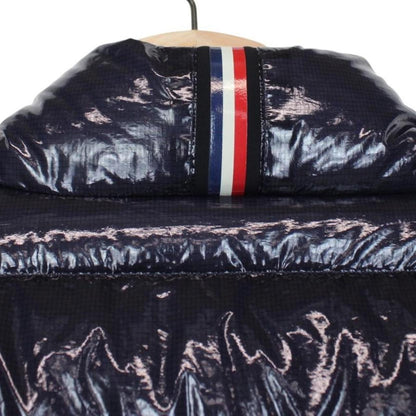 Moncler navy blue full zip down jacket with logo patch and quilted material.