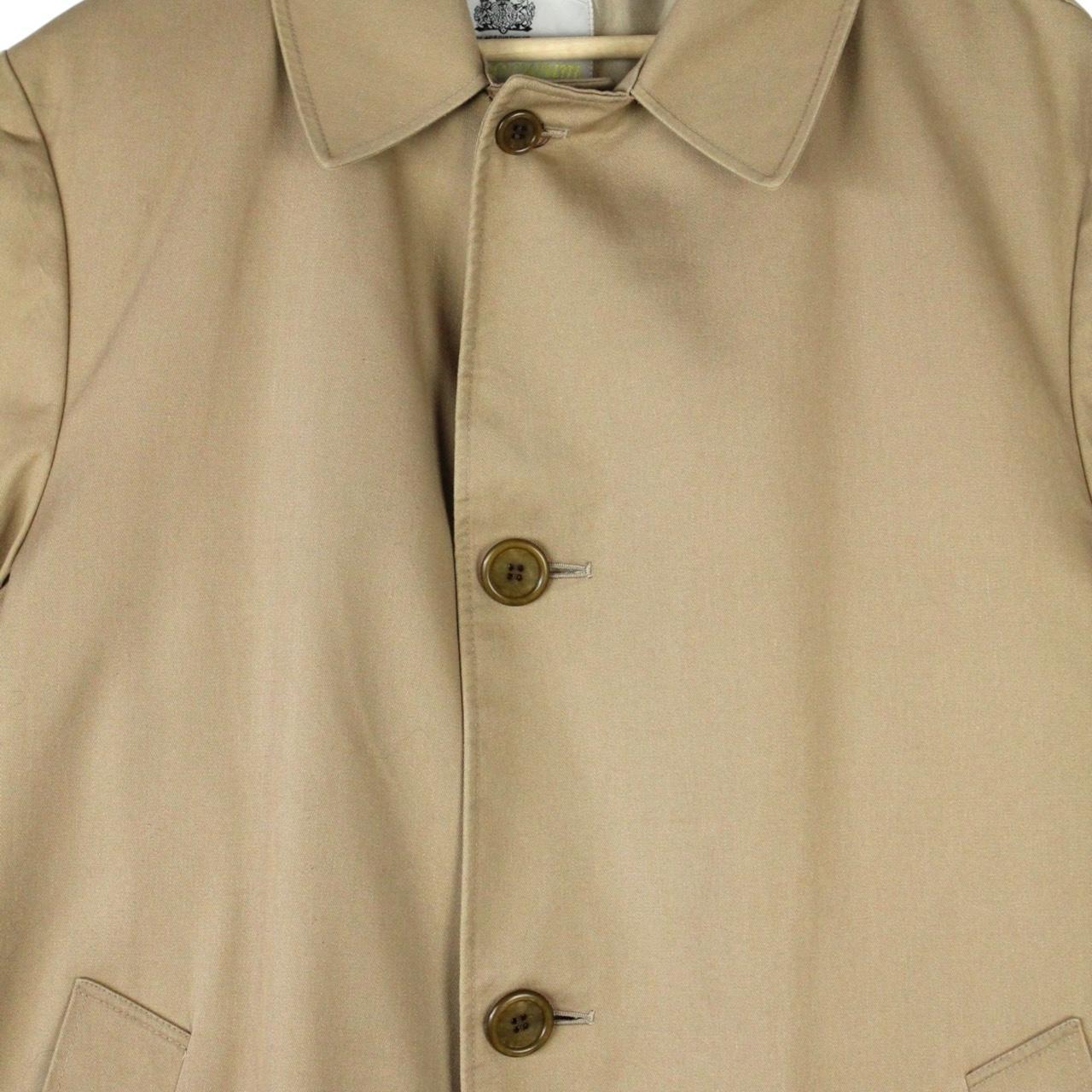 Aquascutum tan brown trench coat with house check pattern and removable wool lining.