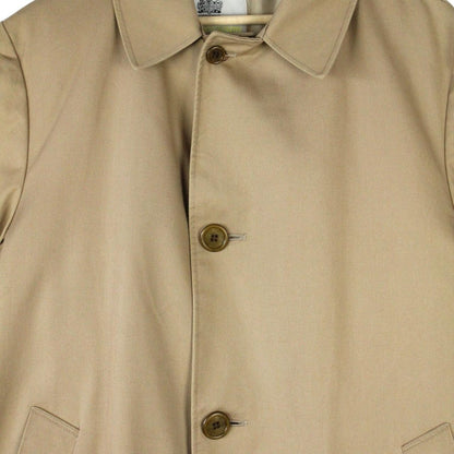 Aquascutum tan brown trench coat with house check pattern and removable wool lining.