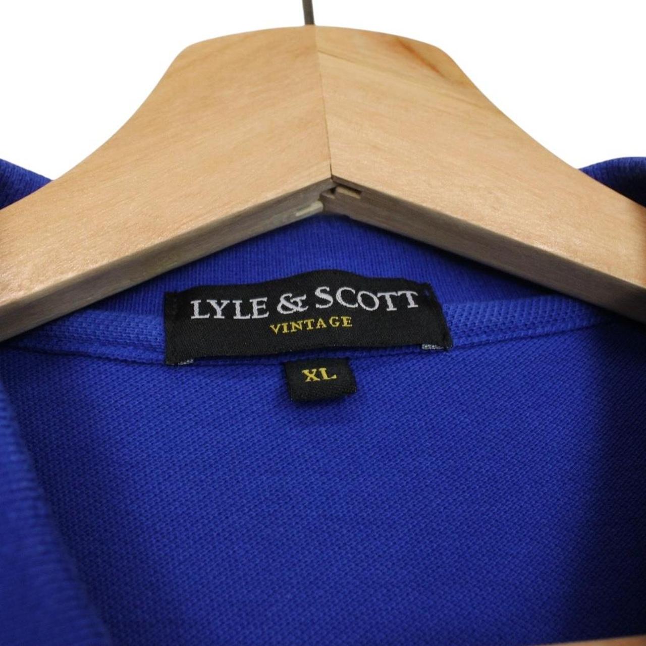 Lyle & Scott blue short sleeve polo shirt with embroidered logo and cotton material.